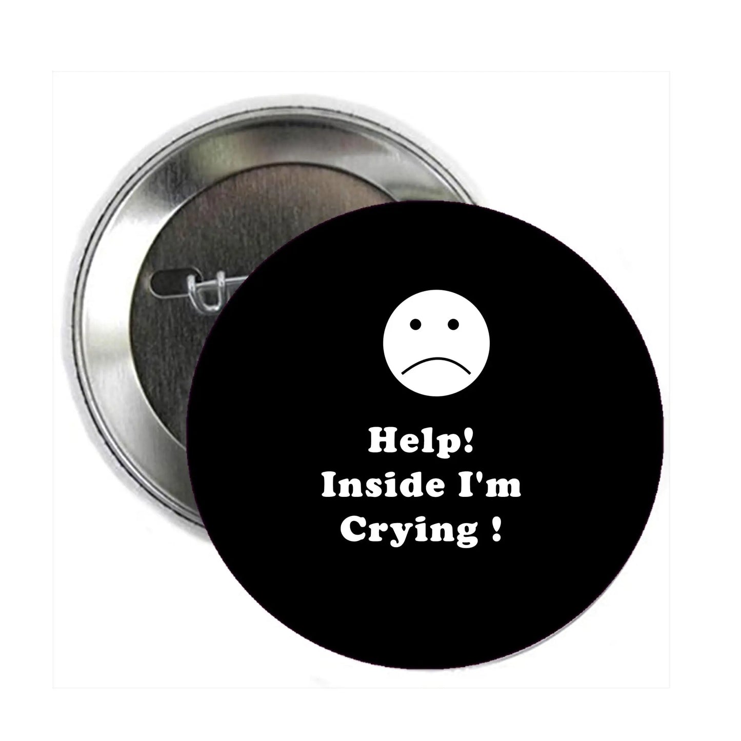 Black pinback badge with white sad face and text “Help! Inside I'm Crying”