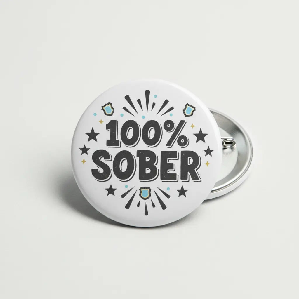 100% Sober pinback button with starburst and black text on round silver badge