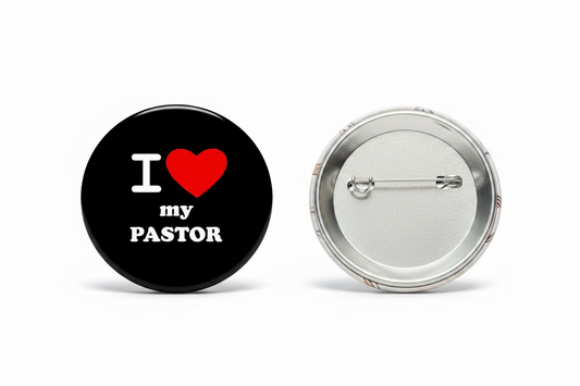 Pinback button showing black front with red heart text and silver back with pin hardware
