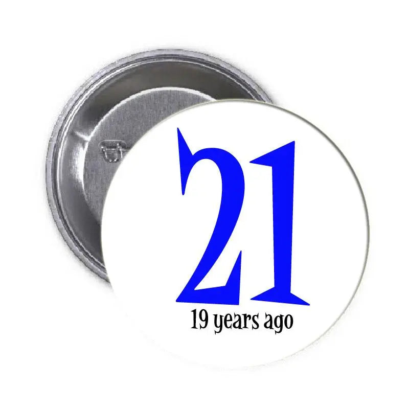 Round pinback button with blue “21” and text “19 years ago”