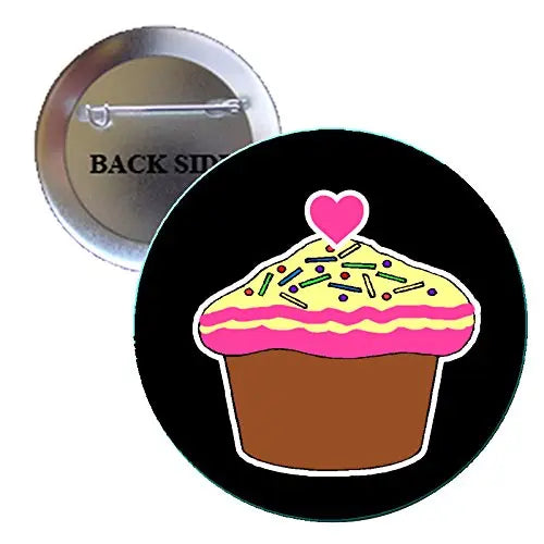 Round black pinback button with pink heart-topped cupcake illustration