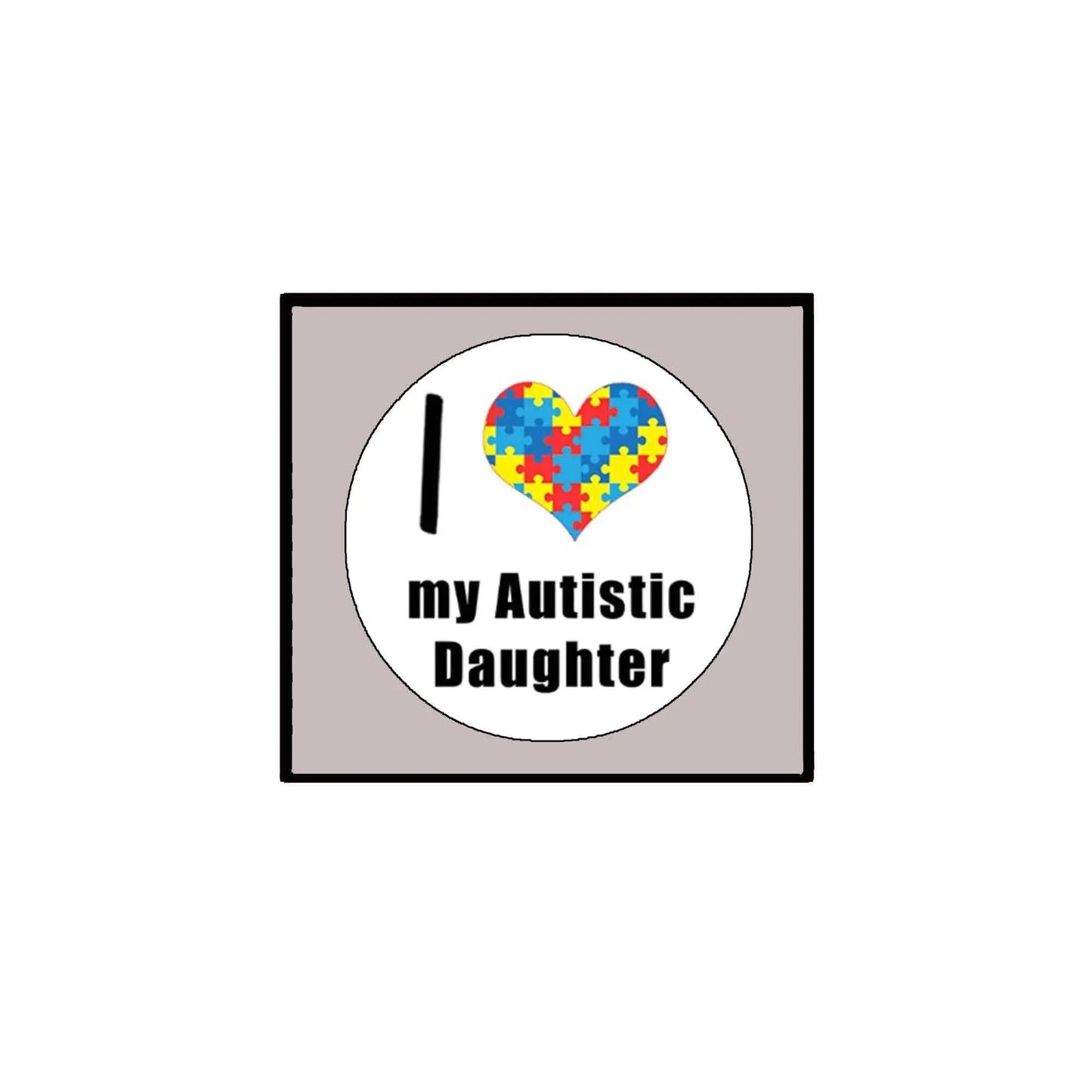 Pinback badge with puzzle heart and text "I my Autistic Daughter"