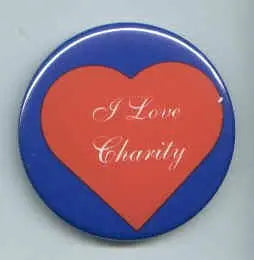 Round charity pin with red heart and 'I Love Charity' lettering on blue background