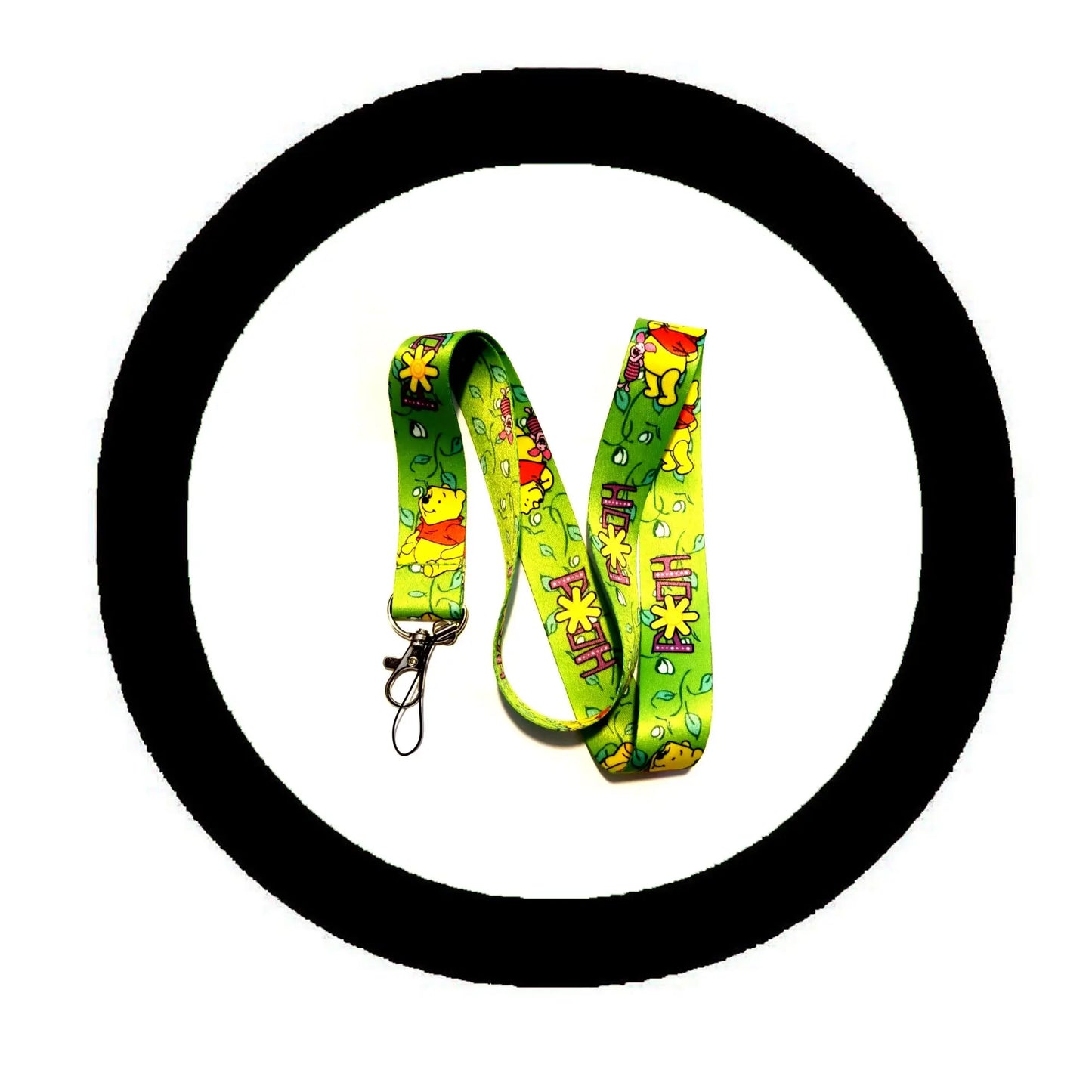 Green cartoon bear themed lanyard with metal clip and clasp, printed fabric strap.