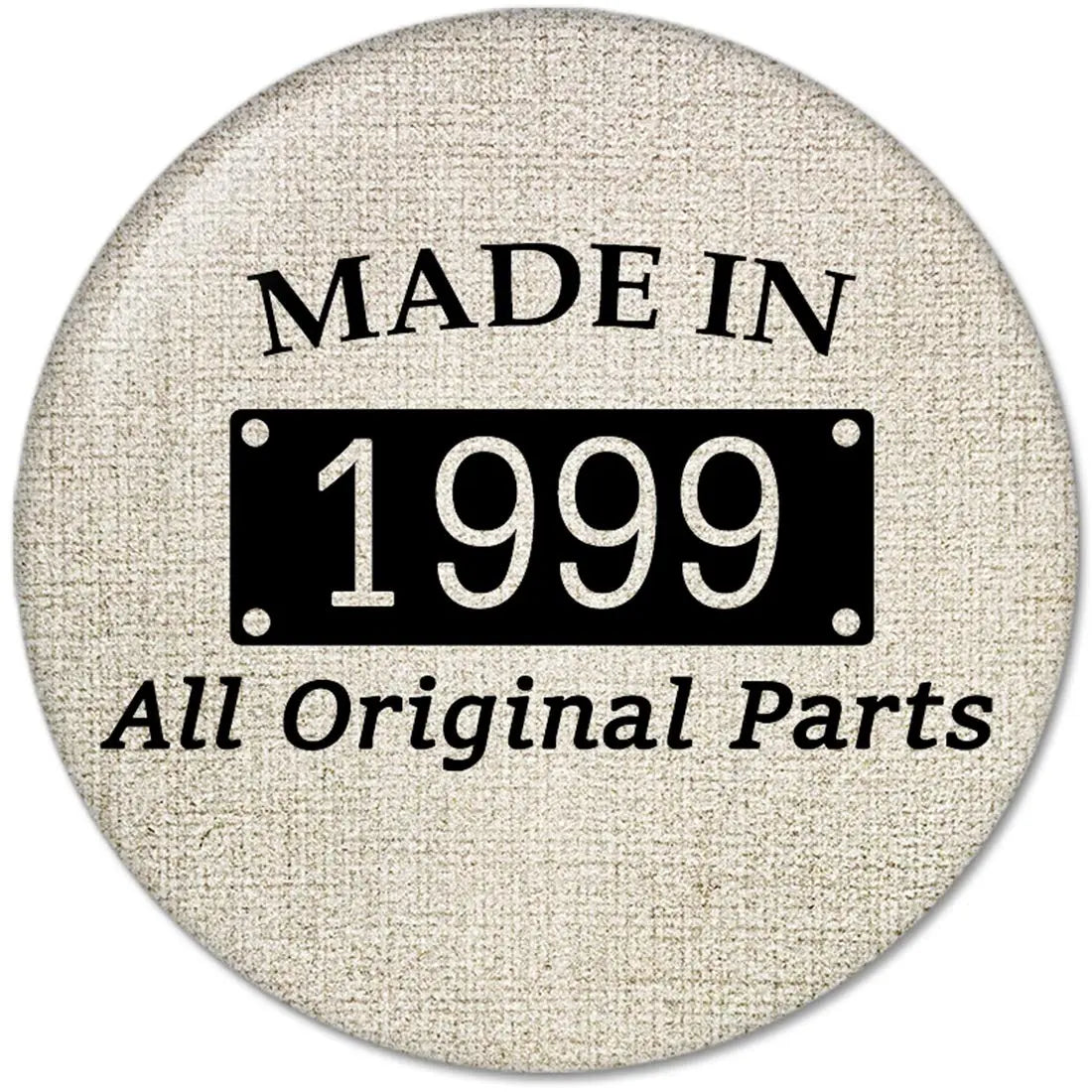 1999 pinback button, circular beige fabric with “MADE IN 1999” and “All Original Parts”