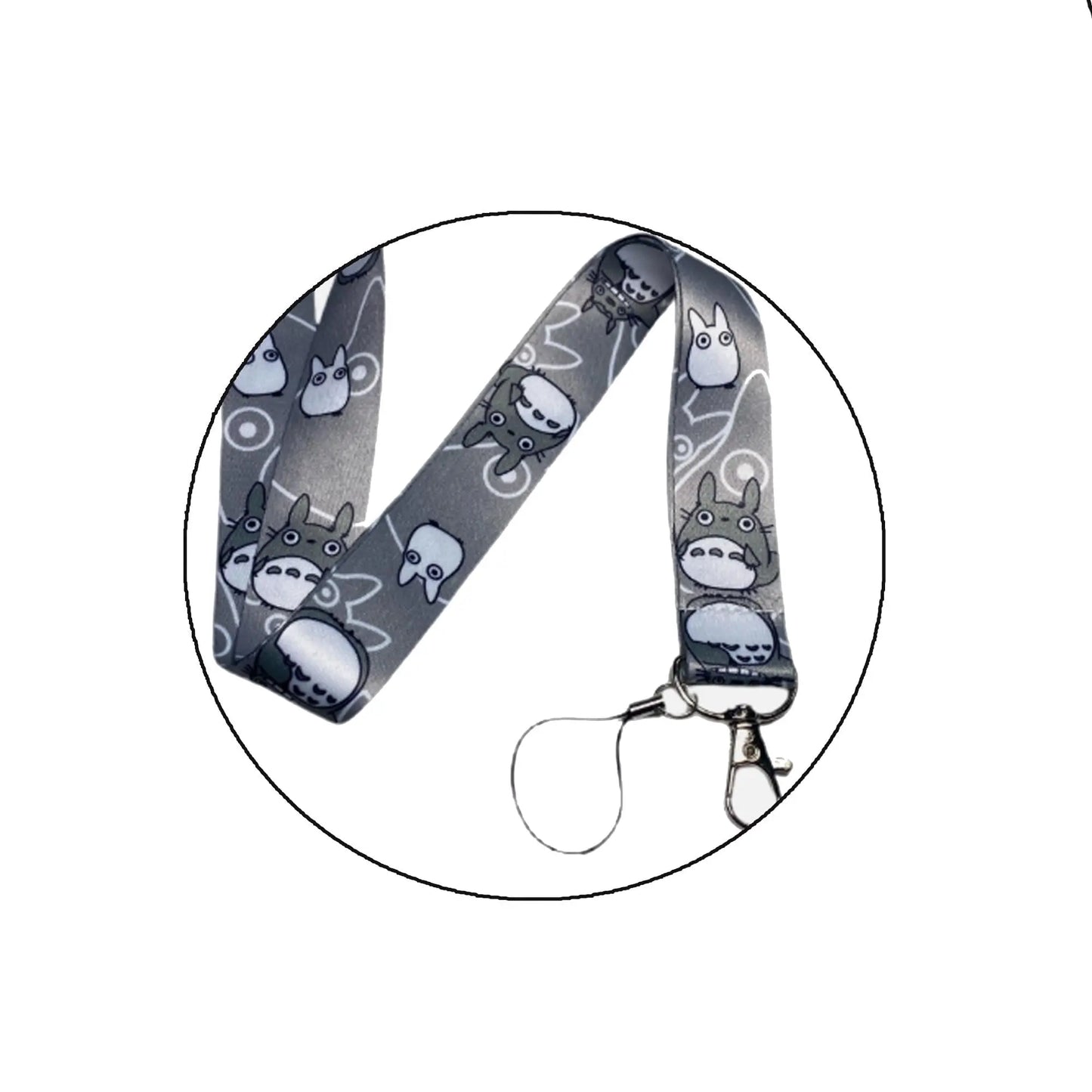 Gray themed lanyard with cartoon characters, key ring and hook phone strap