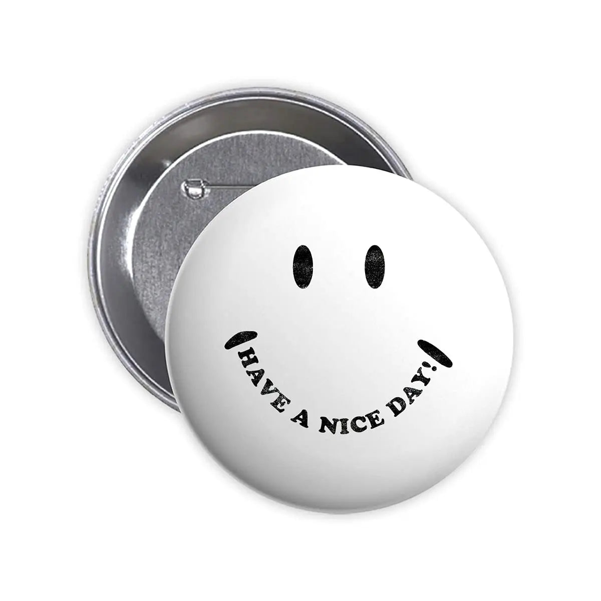 Round white smile pin badge with black eyes and 'HAVE A NICE DAY' text, metal back