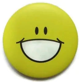Round yellow smiley emoticon pin badge with big grin and wide eyes