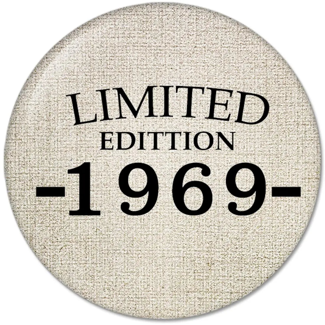 Round 2.25-inch pinback button with beige fabric look and black 'LIMITED EDITION 1969-' text