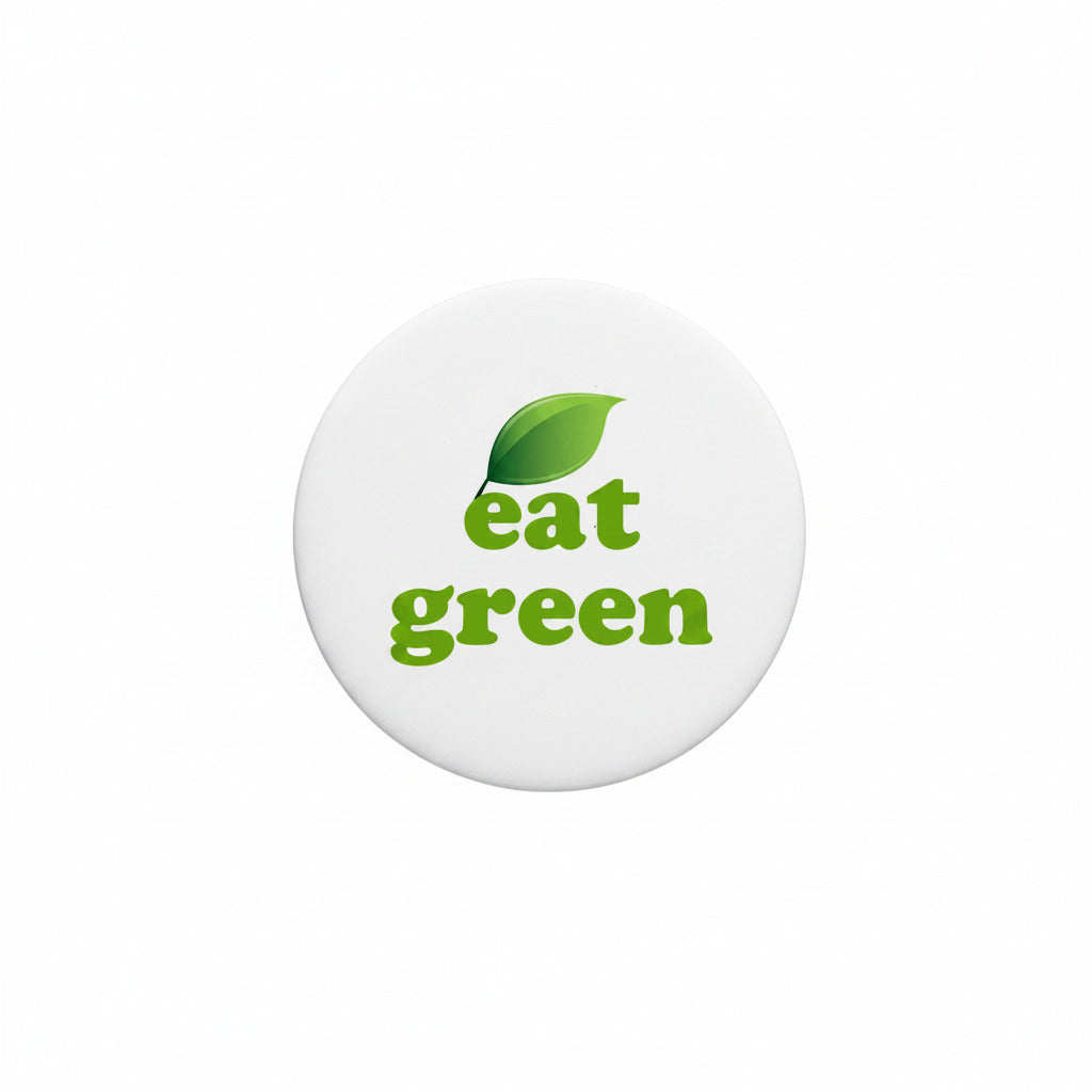 Eat green slogan pinback button, 2.25-inch, black rim with green leaf and text