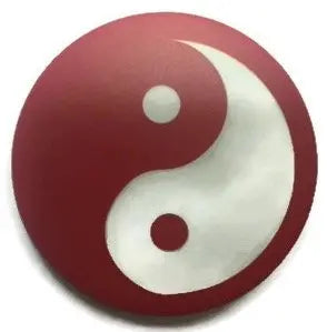 Red and white yin yang pin badge with circular design