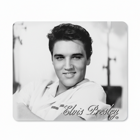 A rectangular mouse pad with rounded corners featuring a black-and-white portrait of Elvis Presley and his signature printed across the lower portion, shown on a plain white background.