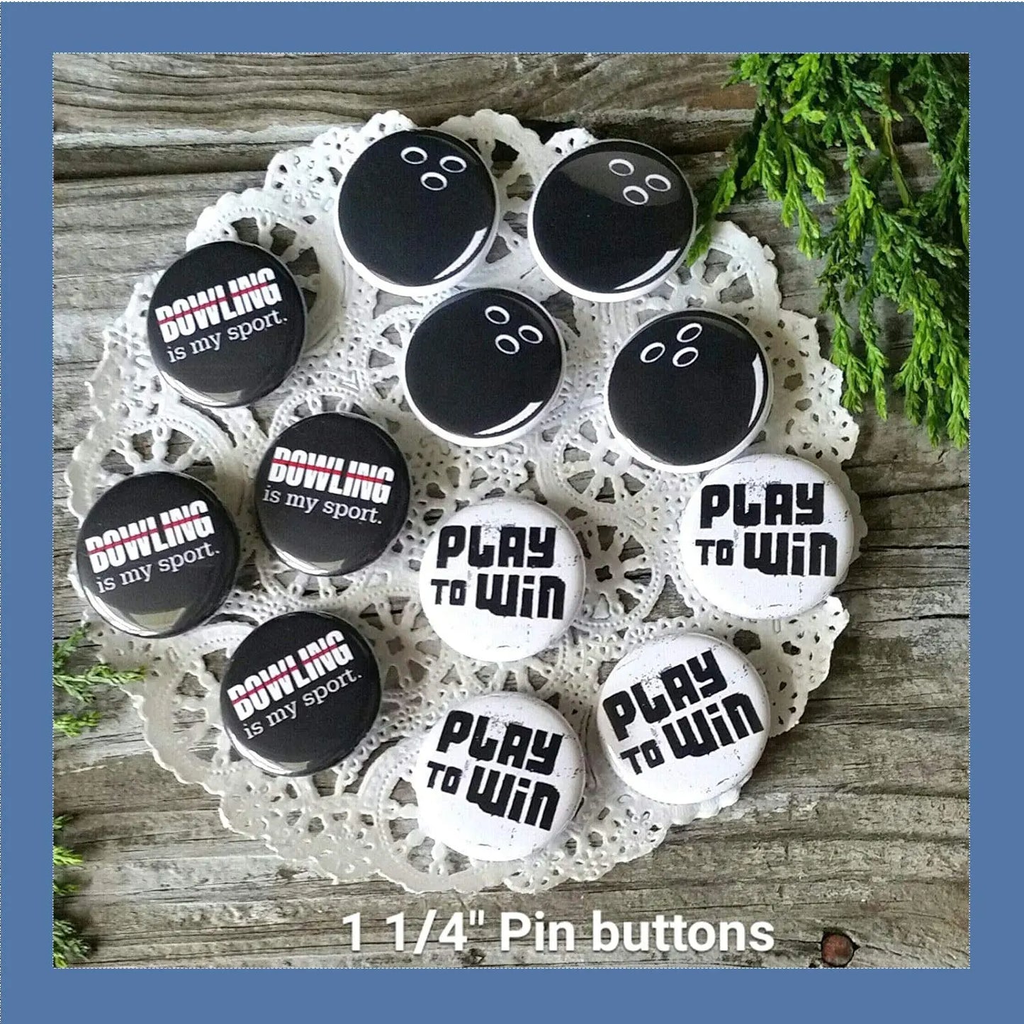 Set of round pinback button pins with black-and-white bowling graphics and “PLAY to WIN” text