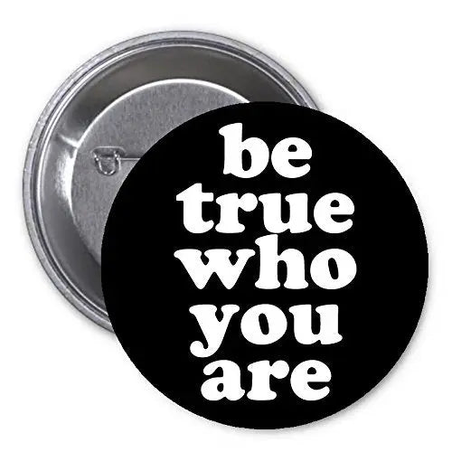 1.25-inch black pinback button with 'be true who you are' in white
