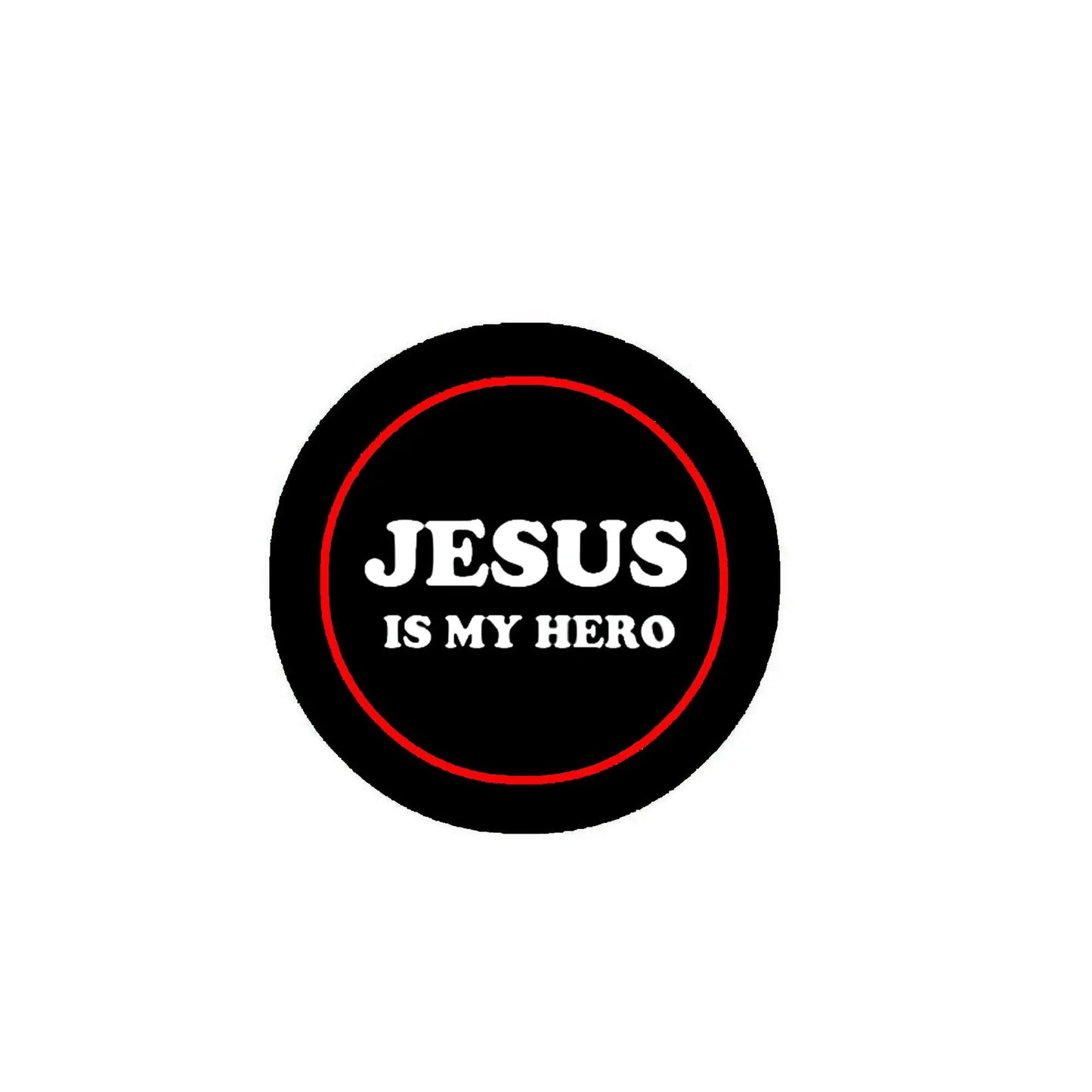 Round badge pin with black face, red ring border, and white “JESUS IS MY HERO” text