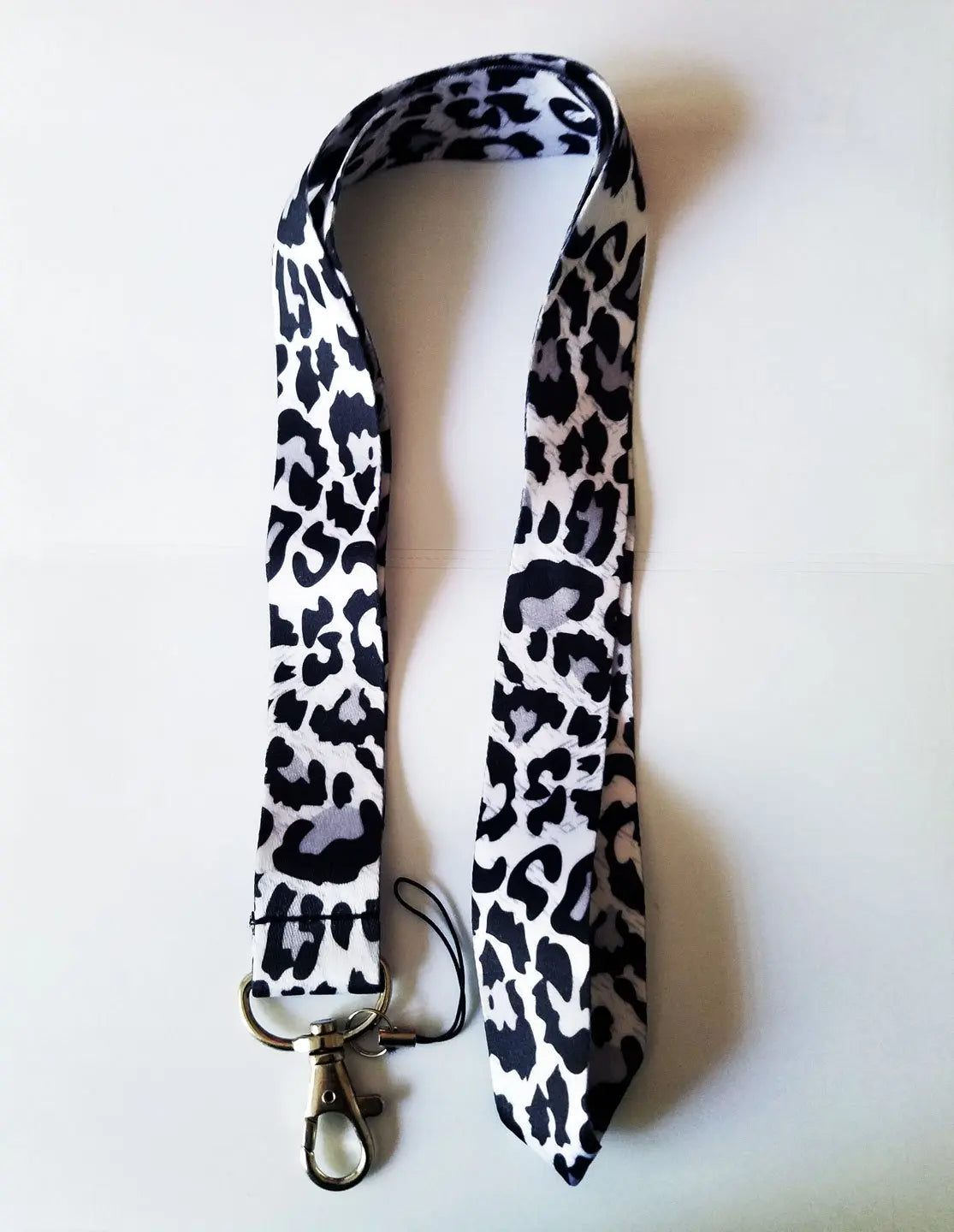 Black and white leopard print lanyard with swivel clasp and keyring