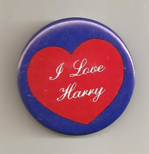 1.25-inch pinback button with blue border and red heart reading I Love Harry