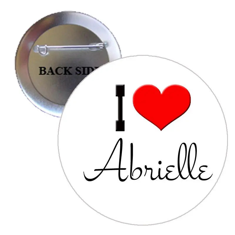 Round pinback button with red heart and "I heart Abrielle" text