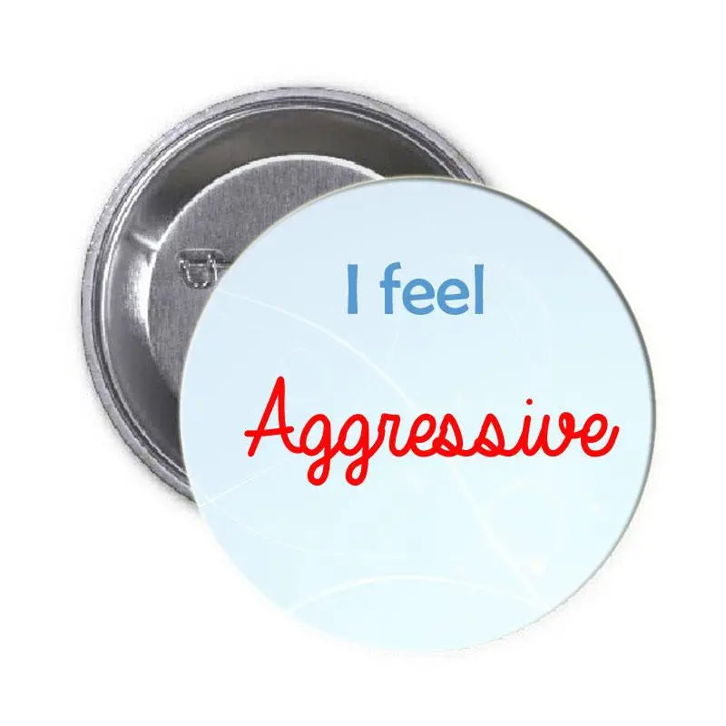 1.25-inch pinback button with light blue front text 'I feel Aggressive', silver back