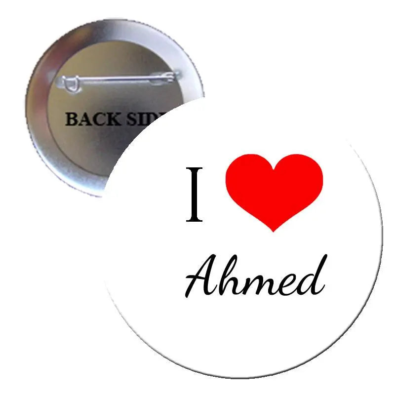 1.25-inch pinback button pin with white "I ♥ Ahmed" design