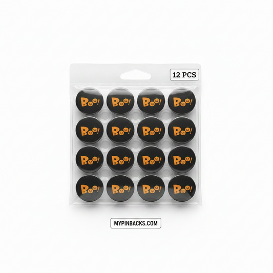 Pack of 12 black round foam balls with orange 'Bee!' logos, sealed in a clear plastic blister pack on a white background.