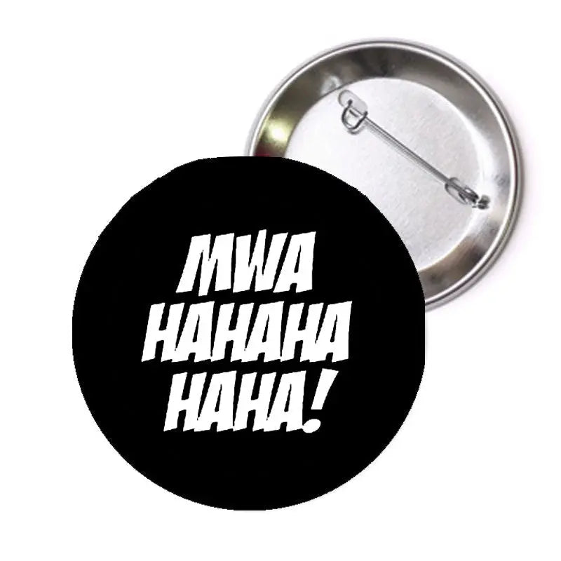 1.25-inch pinback button with black face and white MWAHAHAHAHAHA text
