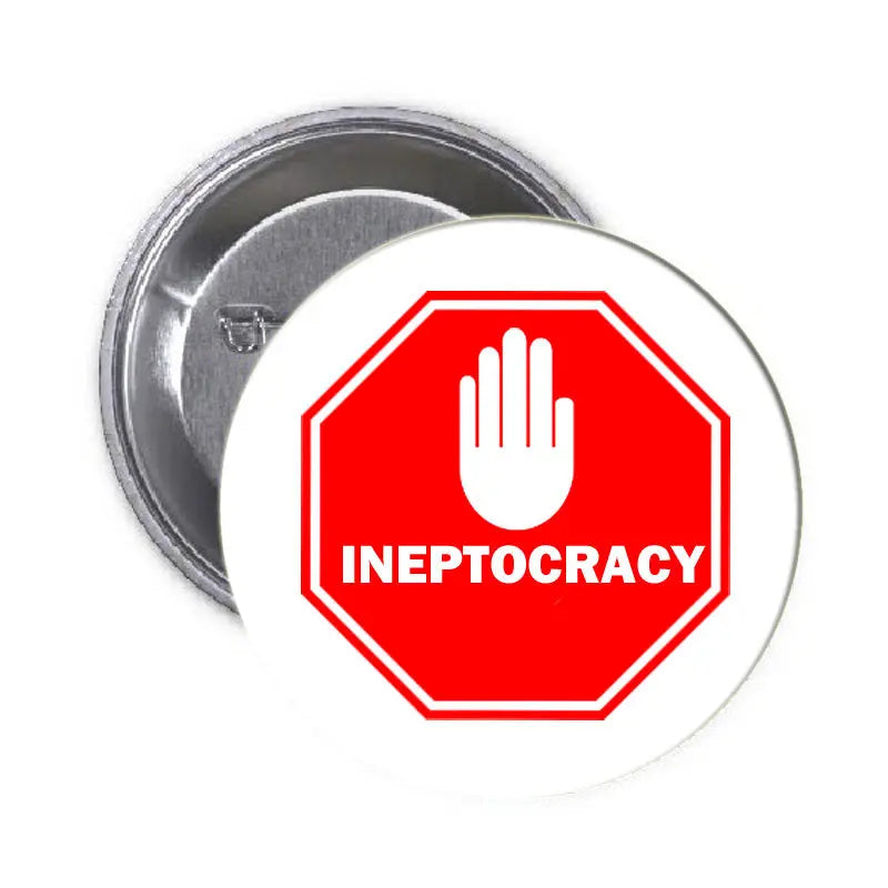 1.25-inch pinback button with red stop hand and INEPT0CRACY octagon design