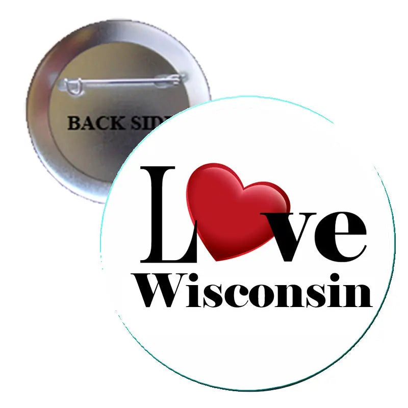 Round pinback button: white face with red heart and “Love Wisconsin” black lettering