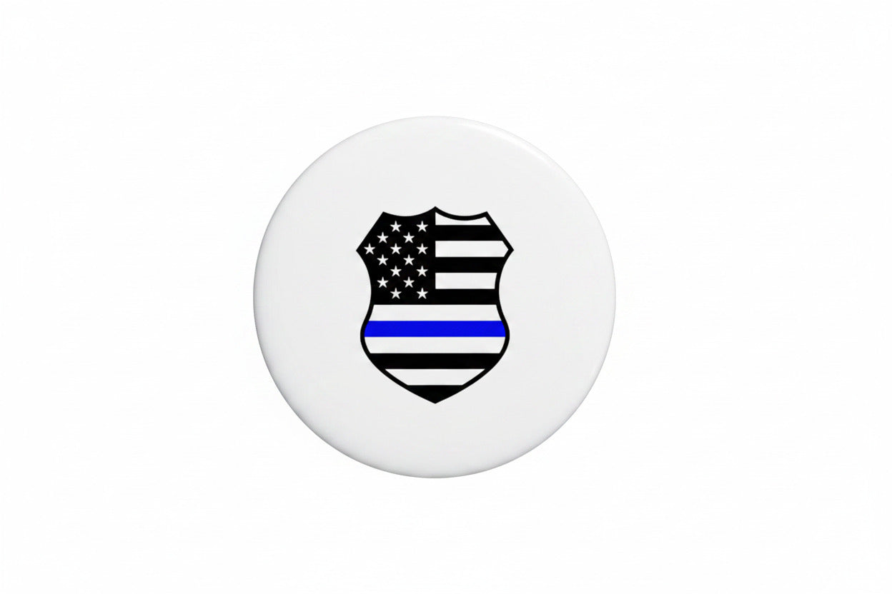 Shield-style USA blue line lapel pin with striped stars and stripes crest
