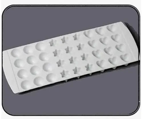 Ice cube tray with heart, star, and circle ice molds