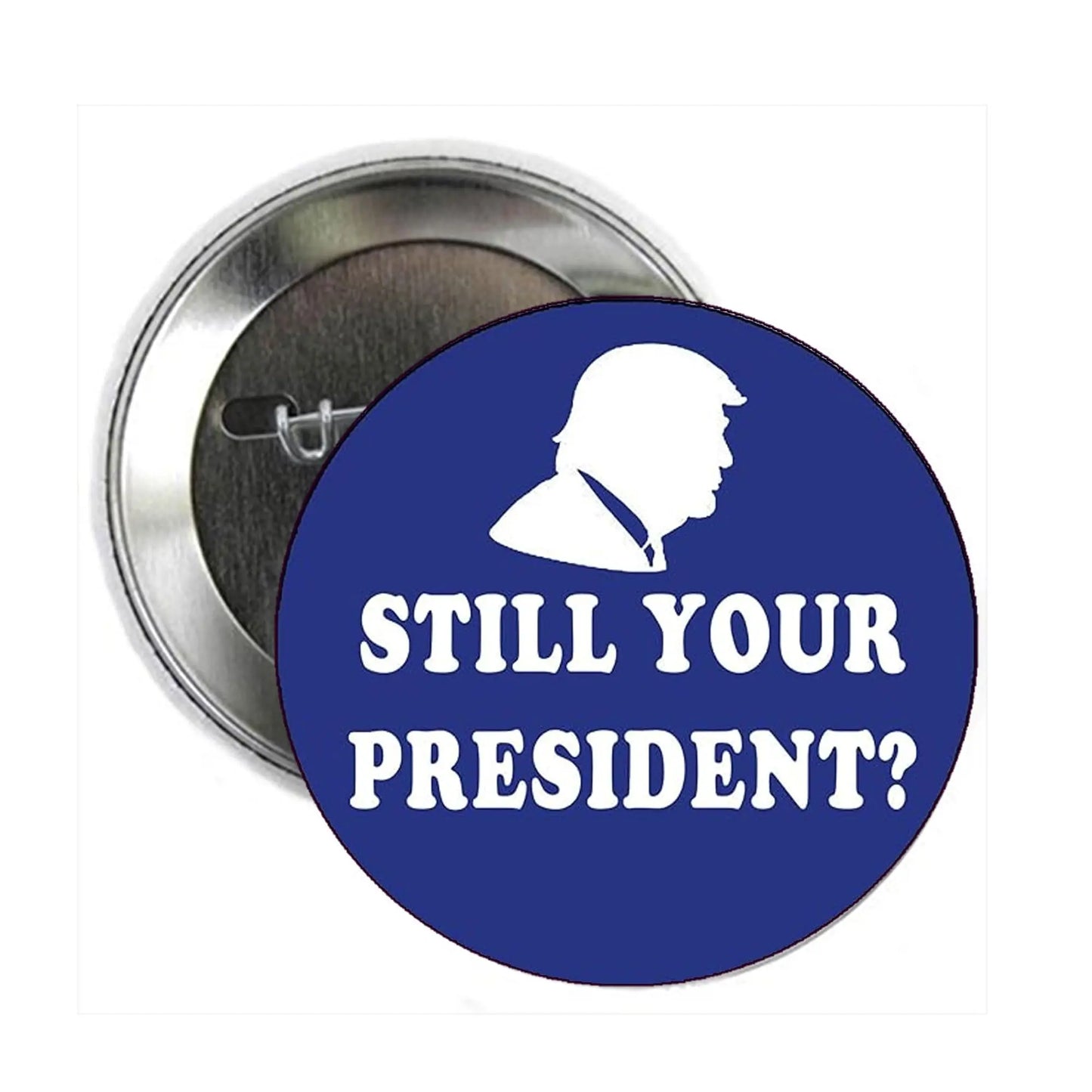 Blue and silver pinback button with white text "STILL YOUR PRESIDENT?"
