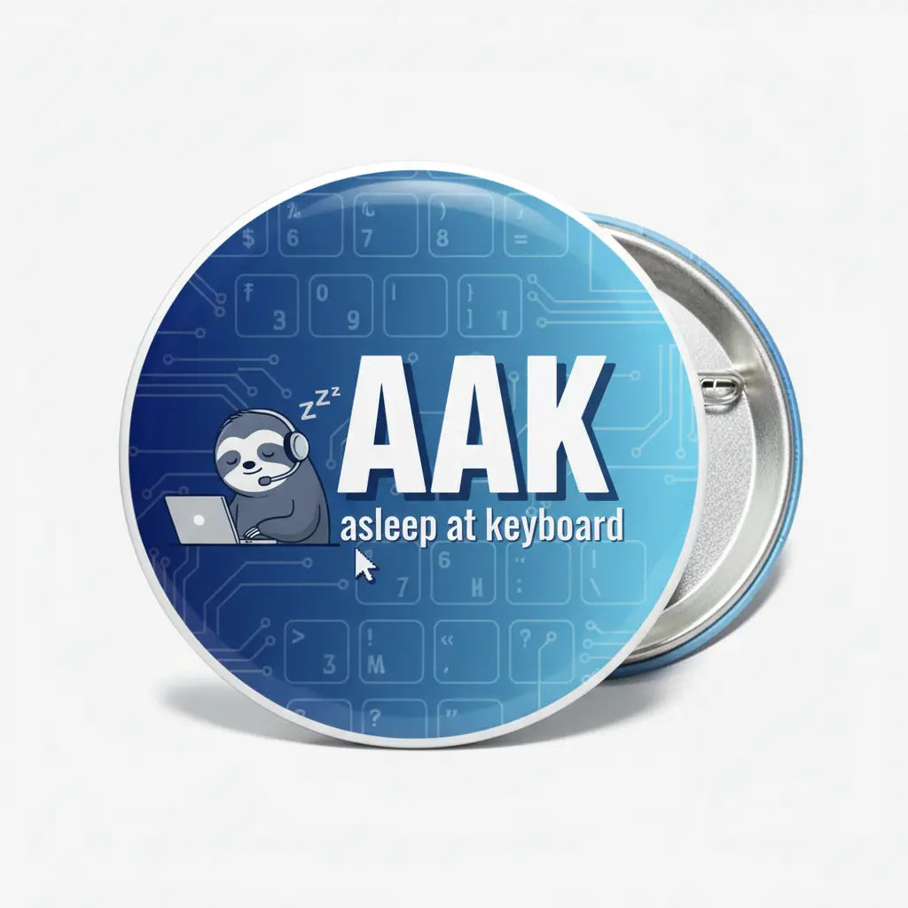 2.25-inch round pinback button, blue with AAK asleep-at-keyboard text and character