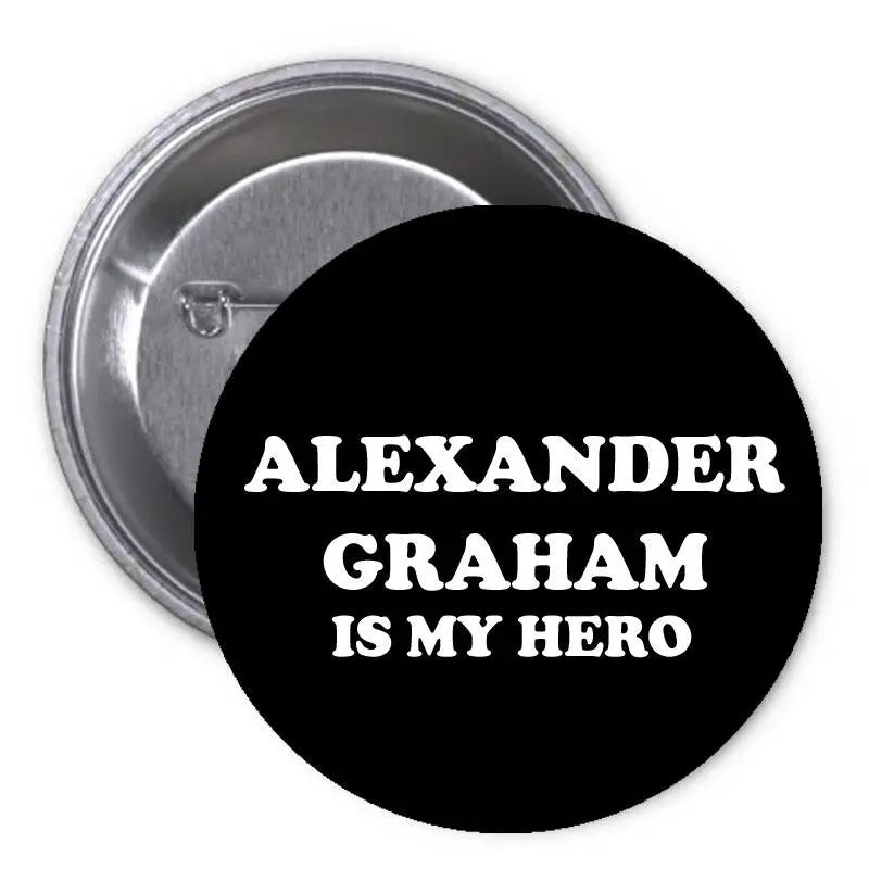2.25-inch black pinback button with white "ALEXANDER GRAHAM IS MY HERO" text