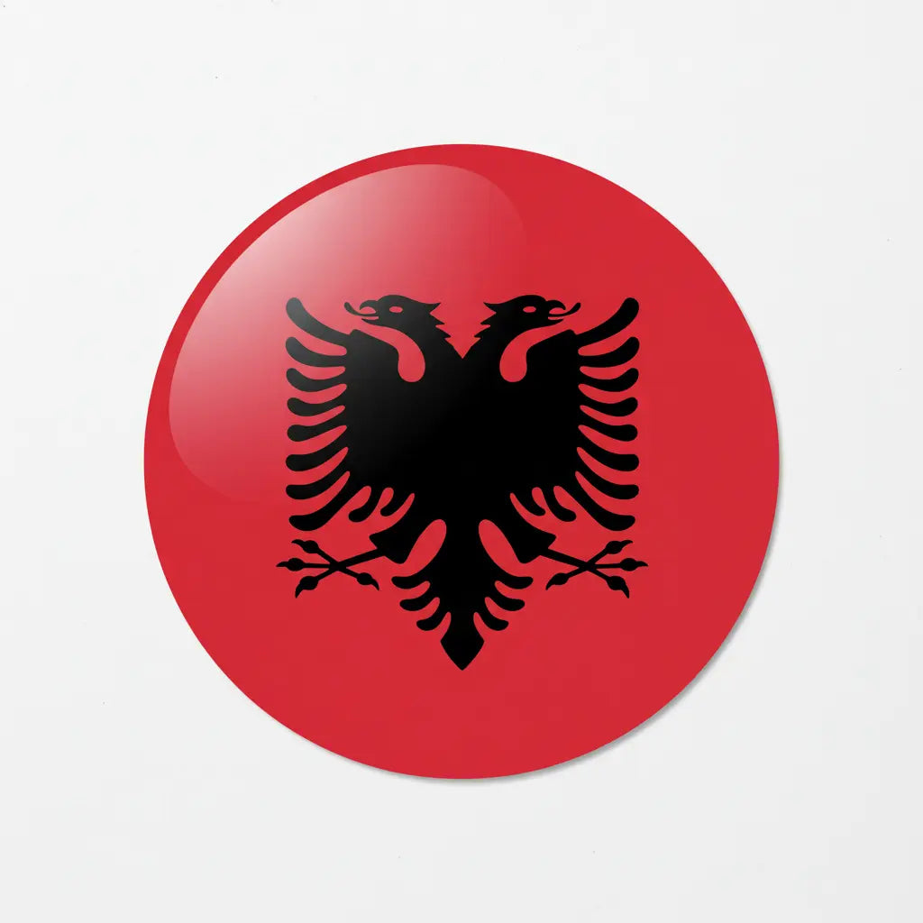 Albania flag circular keychain with black double-headed eagle on red background