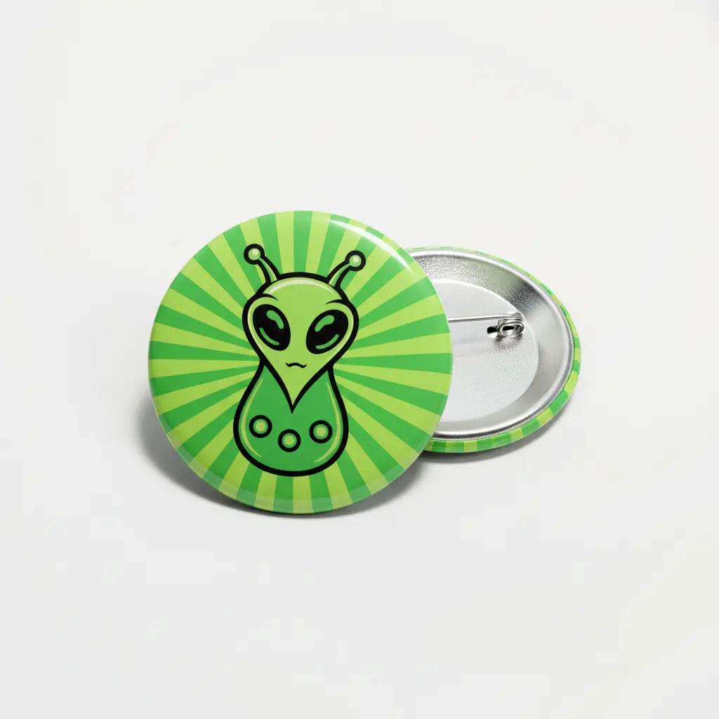 Alien green pinback button with striped alien face and metal safety pin back