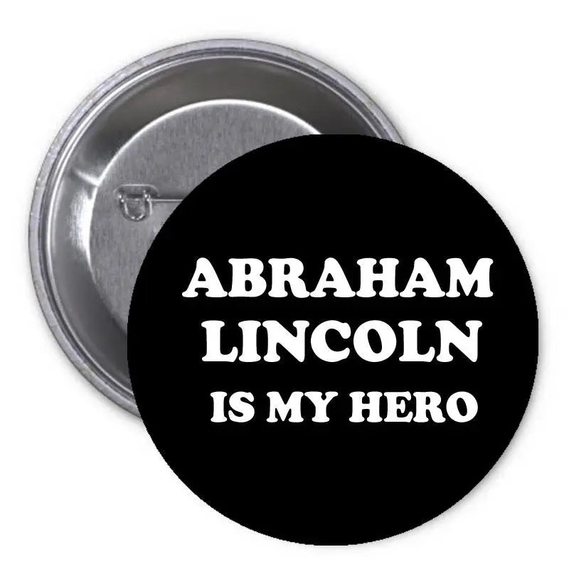 Black pinback button with white "ABRAHAM LINCOLN IS MY HERO" text and silver back