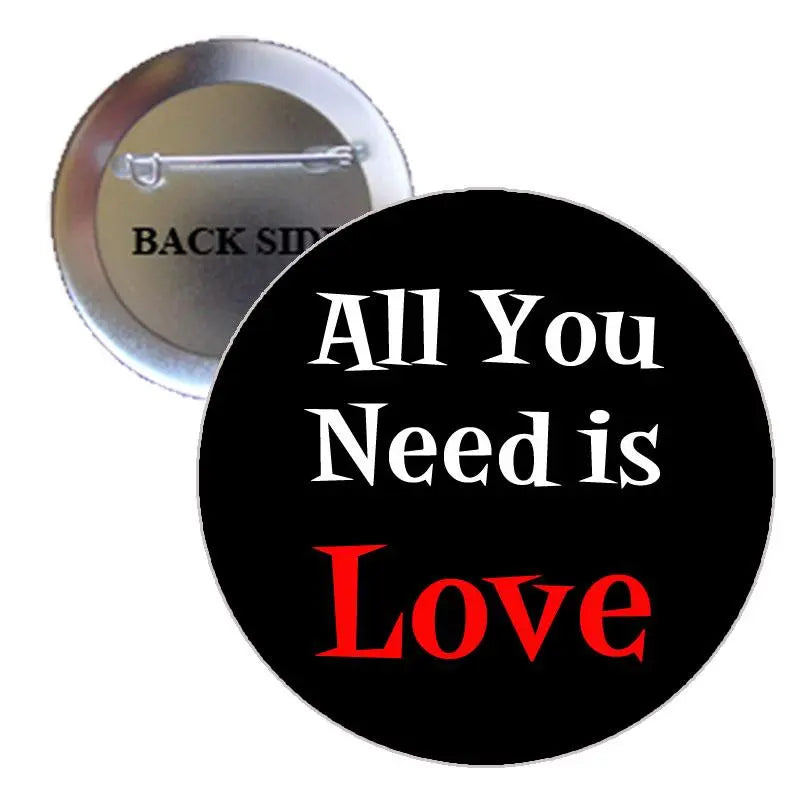 1.25-inch pinback button with “All You Need is Love” text in black and red/white