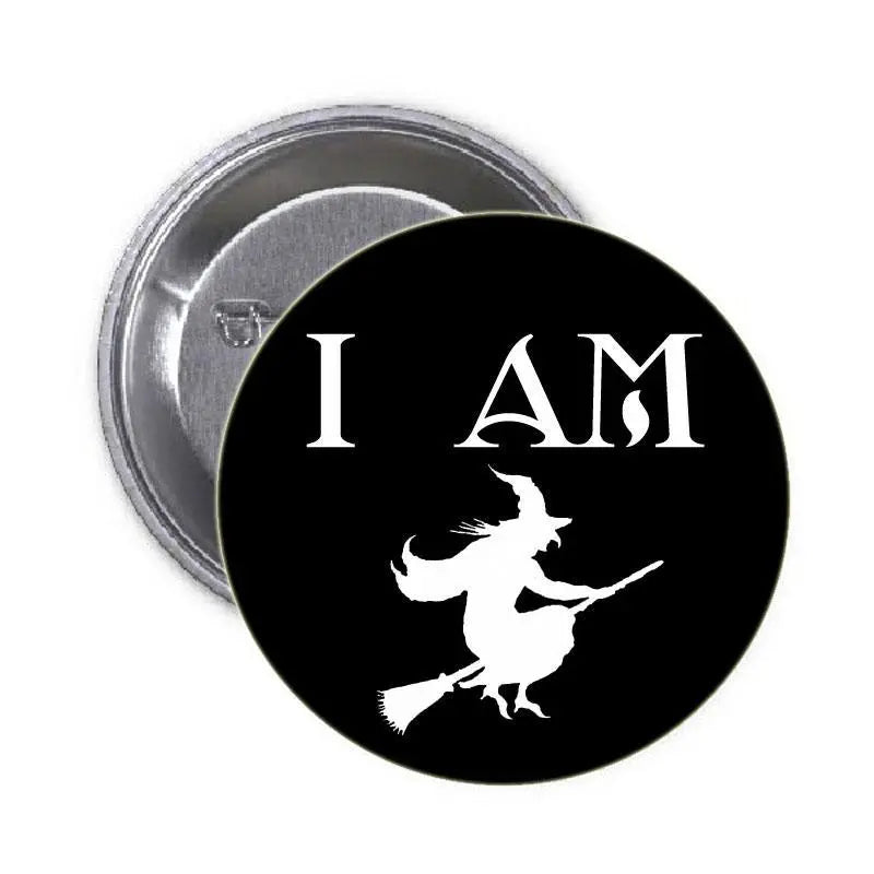 Black witch pinback button with “I AM” text and white witch silhouette