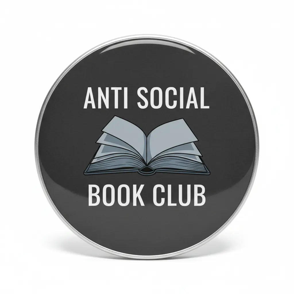 Round black pinback button with white 'ANTI SOCIAL BOOK CLUB' and open book icon