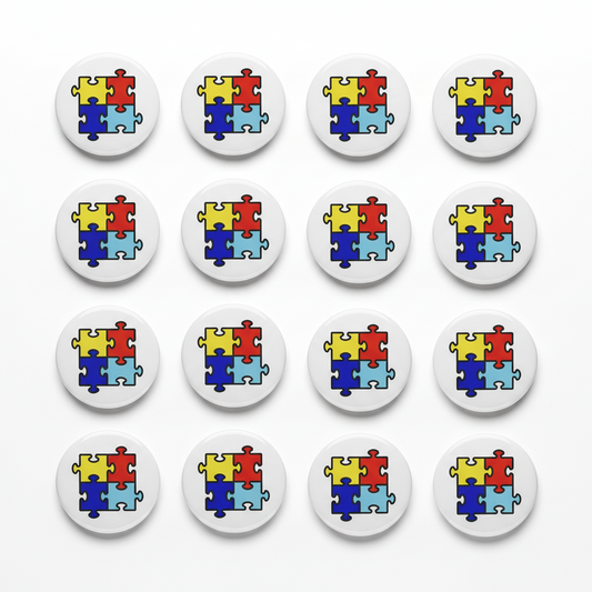 Set of puzzle piece art pinback buttons, round white enamel with colorful jigsaw designs