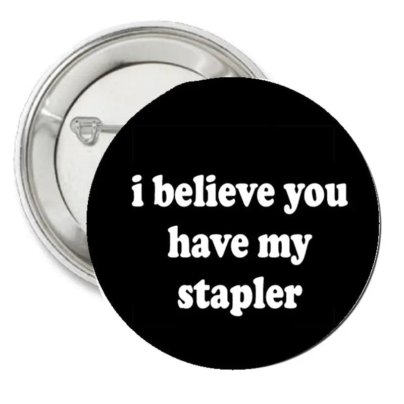 2.25-inch pinback button: i believe you have my stapler text