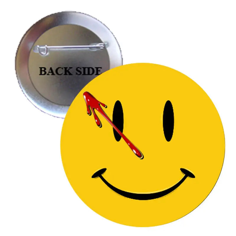 2.25-inch yellow smiley pinback button with black eyes and a bloody red grin