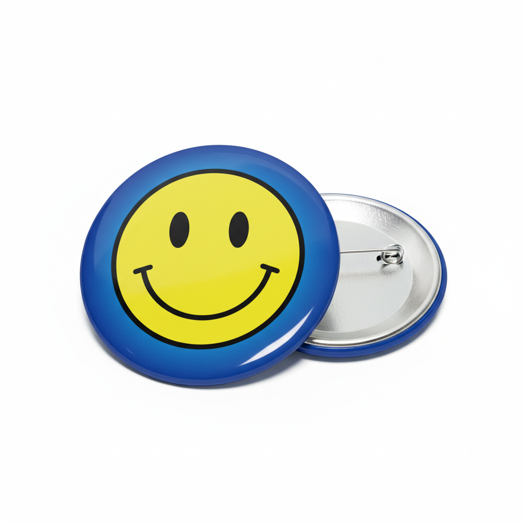 2.25-inch blue smiley face pinback button with yellow smile and metal clasp backing