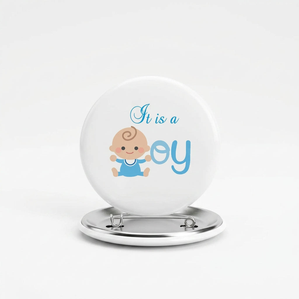 Round pinback button with baby icon and "It is a boy" text