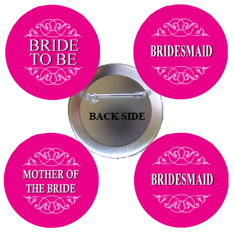 Set of four pink pinback buttons with white wedding roles text; includes metal back clip