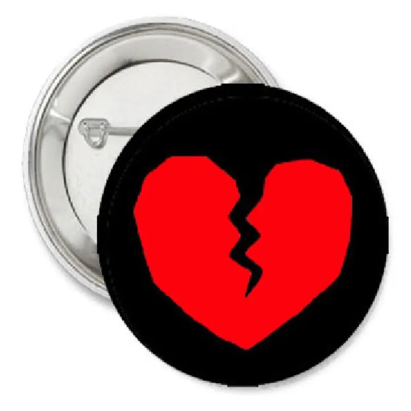 1.25-inch pinback button with black border and red broken heart graphic