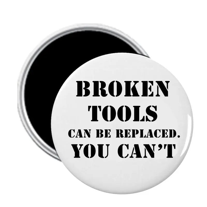 2.25-inch round white magnet with black quote text: BROKEN TOOLS CAN BE REPLACED. YOU CAN'T.