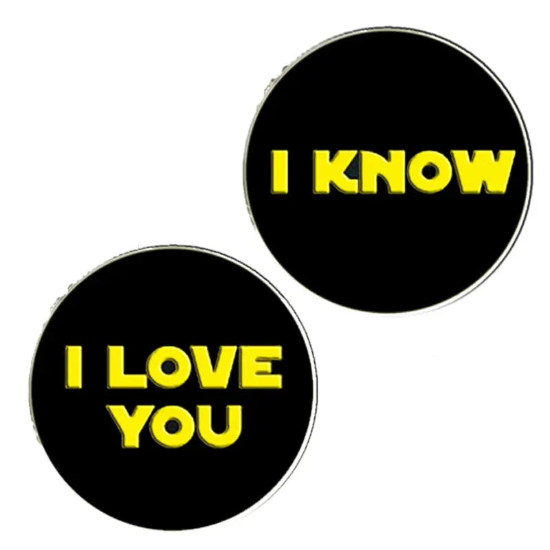 Set of 2 black pinback buttons with yellow text: I LOVE YOU & I KNOW.