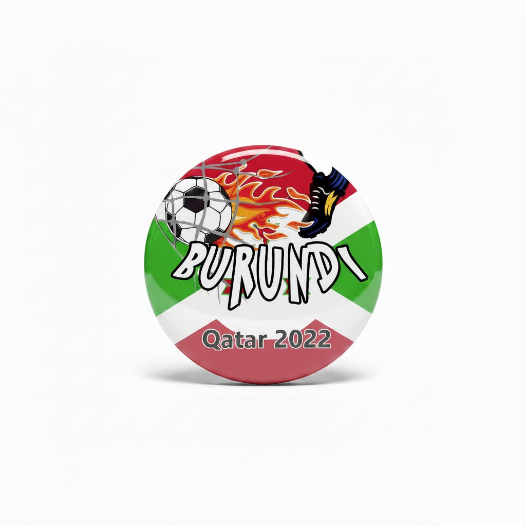 Circular Burundi soccer pinback button with “BURUNDI” and “Qatar 2022” text