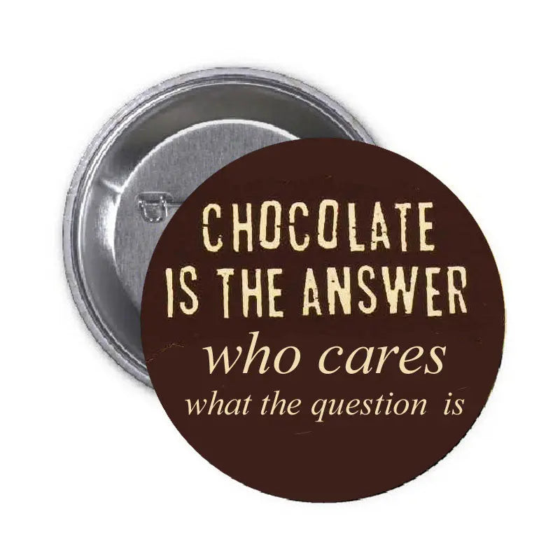 Round brown pinback button with gold text: “Chocolate is the Answer”